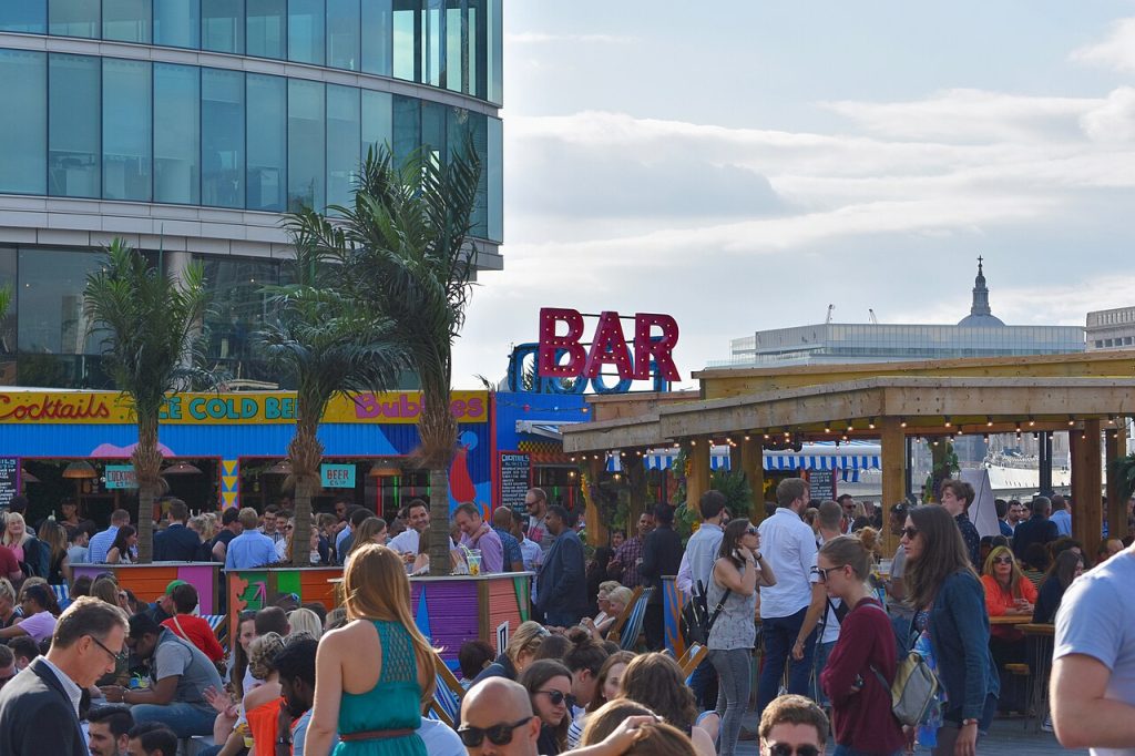 Europe’s Silent Killer: The Heat Deaths Hiding in Plain Sight People enjoying a busy outdoor bar terrace on a summer day in London