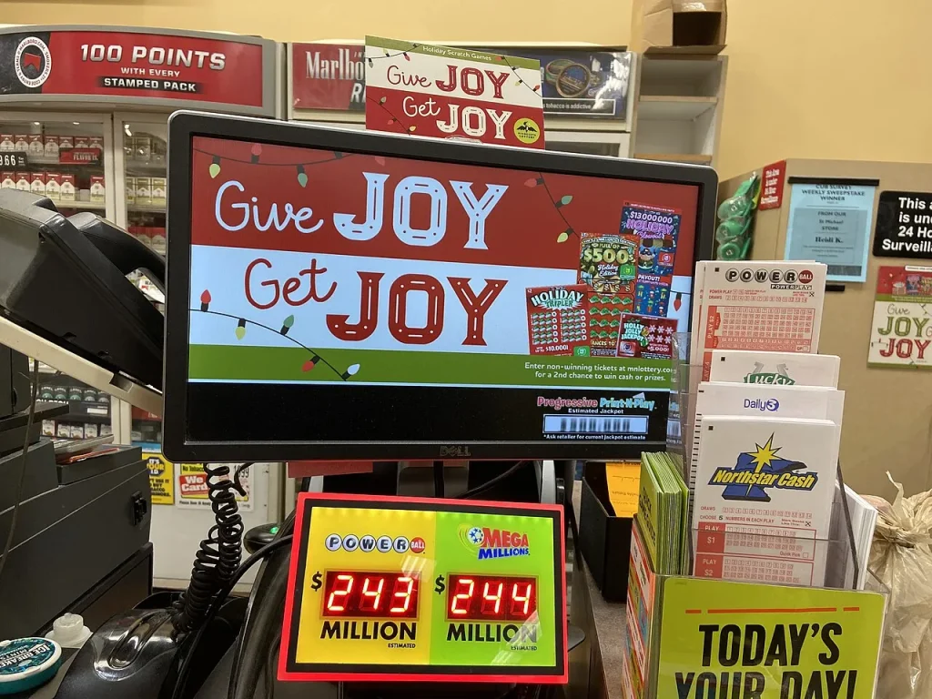 Annuity or Lump Sum After Tax? The $562 Million Powerball Maths Lottery tickets and branding photographed at a seasonal lottery display.